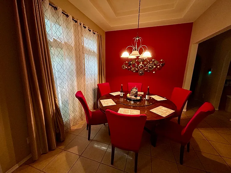 Radiant accent wall with custom art for elegant dinner party entertaining