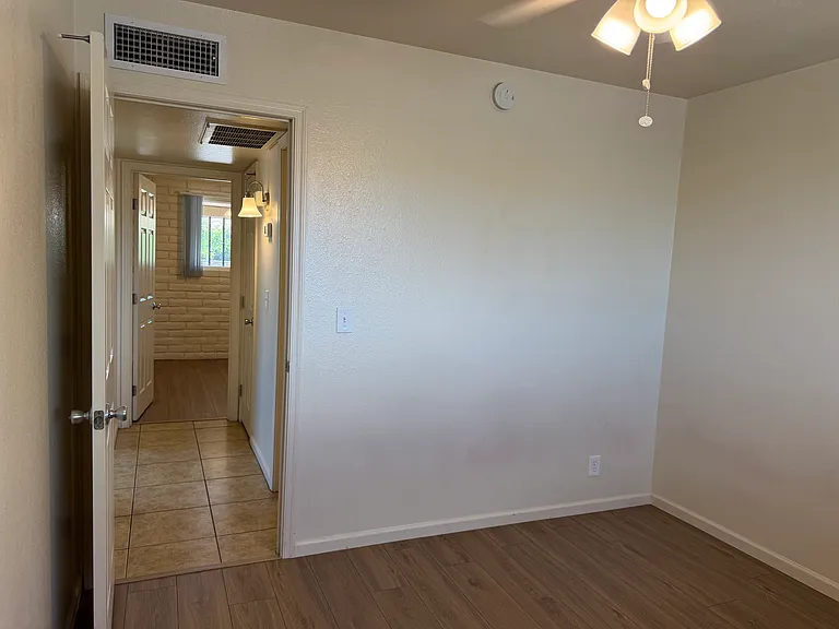 Looking down the hallway from bedroom #2