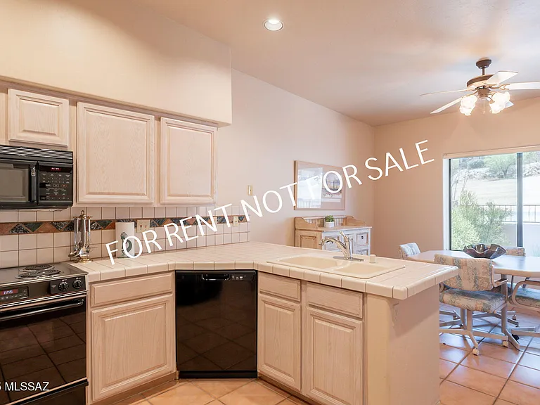 9876 N Ridge Shadow Pl — Photo 15