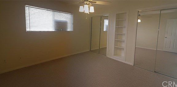 Master bedroom with 2 large closets and custom build in stor