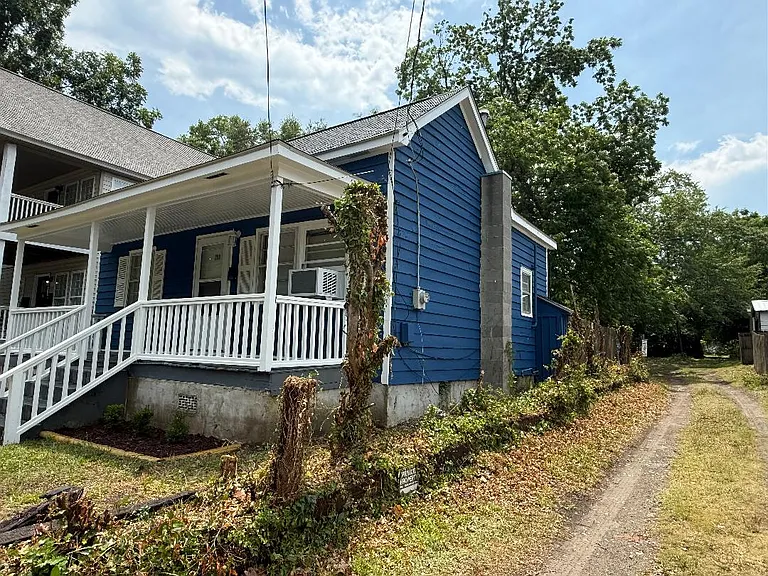 208 S 9th - right front with driveway to the back of the lot where off street parking is.