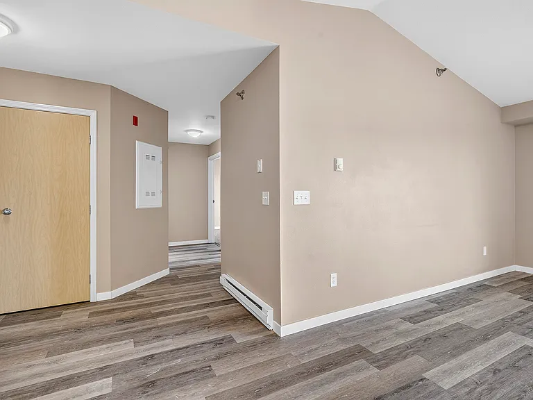 Step into modern living at Minot Place Apartments. This spacious layout features stylish wood flooring and plenty of natural light, creating a welcoming atmosphere. Ready to elevate your lifestyle? Schedule a visit today!