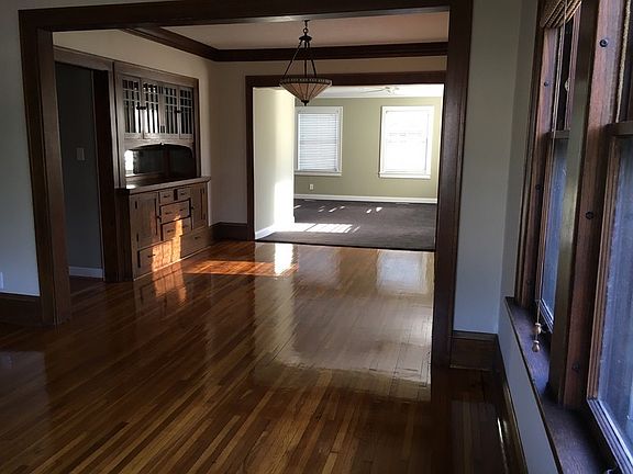 VIEW THROUGH DINING ROOM TO FAMILY ROOM