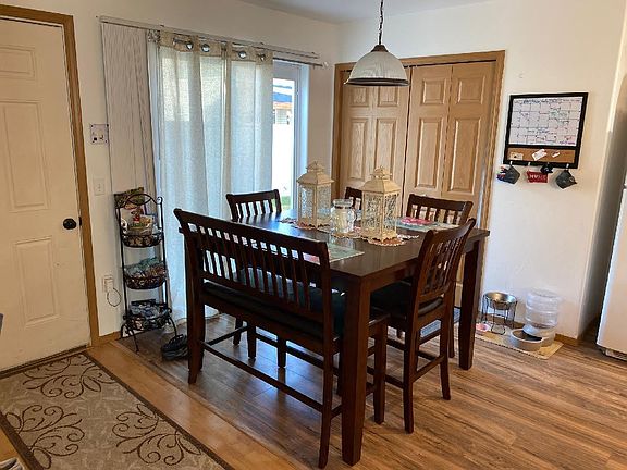 Dining Area / Pantry Closet / Sliding Back Door to Backyard / Door to Garage
