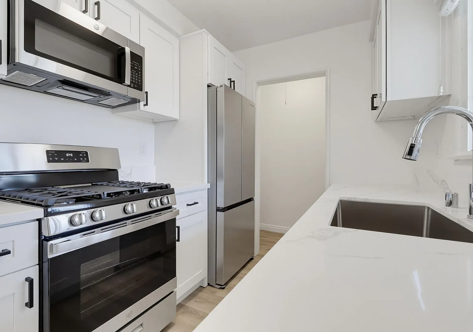 Modern 1BD Apt w/ Stainless Steel Appliances and On-Site Laundry — Photo 1