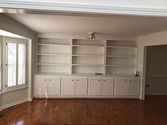 Front Office, Sitting Room, or Library...whichever works best for you and your family. This space has tons of storage.