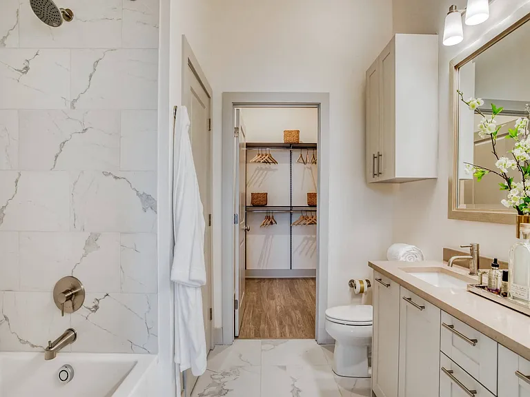 Spa inspired bathrooms with large soaking tubs.