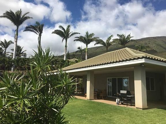 PARTIAL VIEW OF LANAI AND YARD