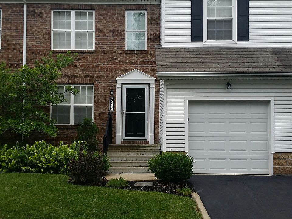 Front faces wooded area