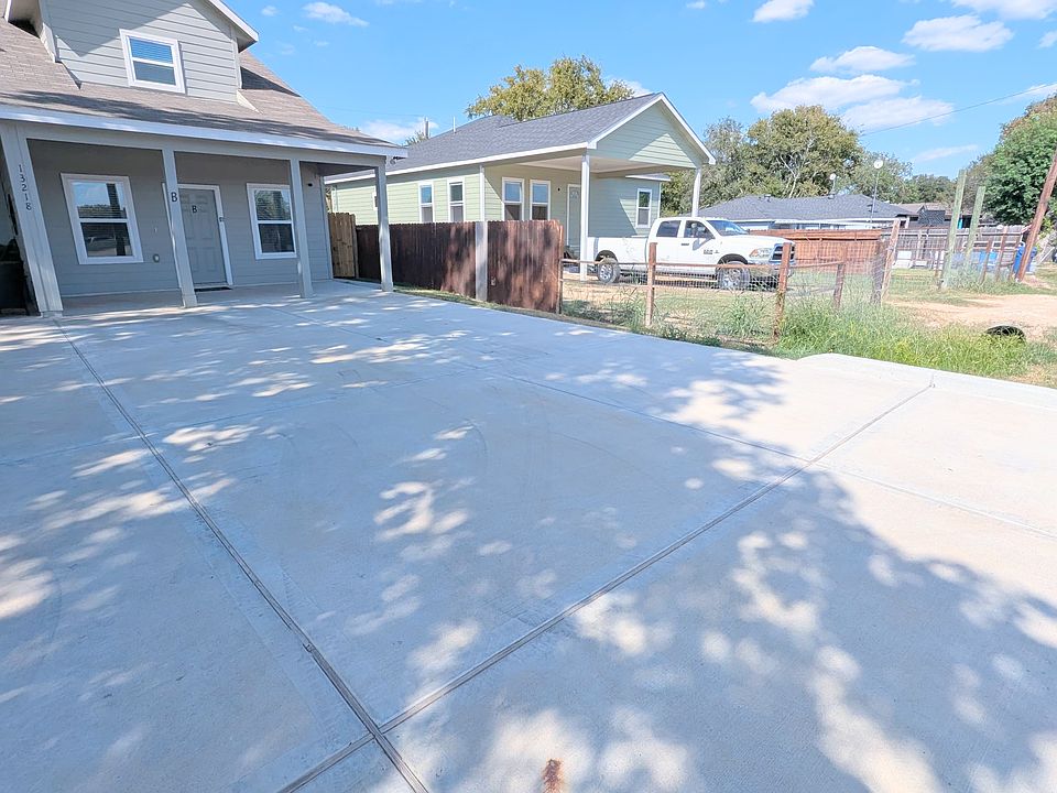 Long paved drive for parking of up to four vehicles.