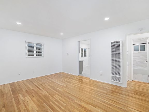Continuous, freshly updated hardwood floors from room to room.