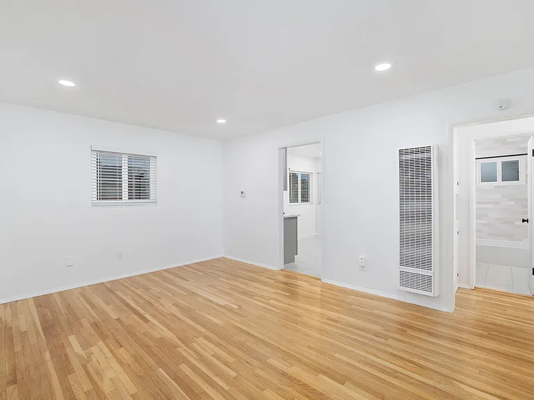 Continuous, freshly updated hardwood floors from room to room.