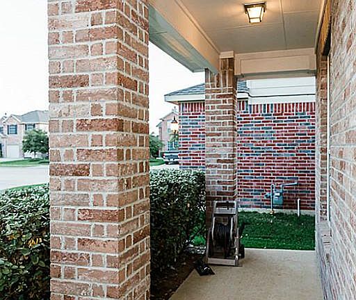 Welcoming porch out front greeting you upon entry