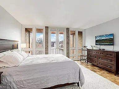 Master bedroom and gorgeous Lake Anne View