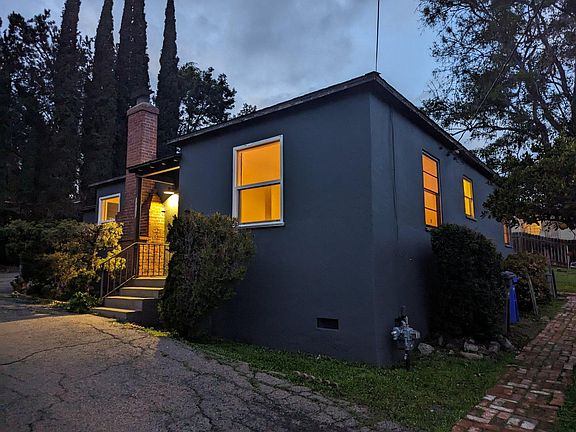 View of entrance and front bedroom windows