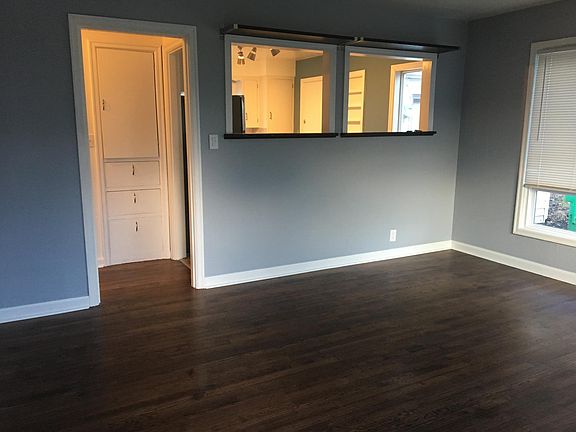Bright and Open Living Room. Beautiful original hardwoods.