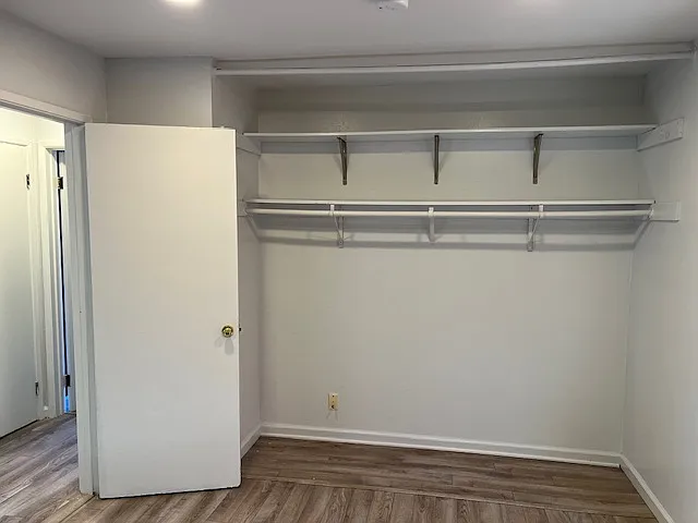 second bedroom , with one more wall to wall closet.