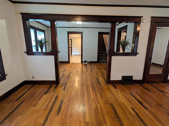 Living room looking into dining & kitchen