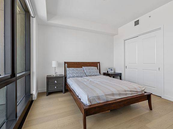 Bedroom is unfurnished (full size bed for reference)