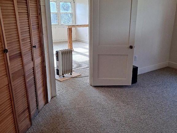 Master bedroom showing closet