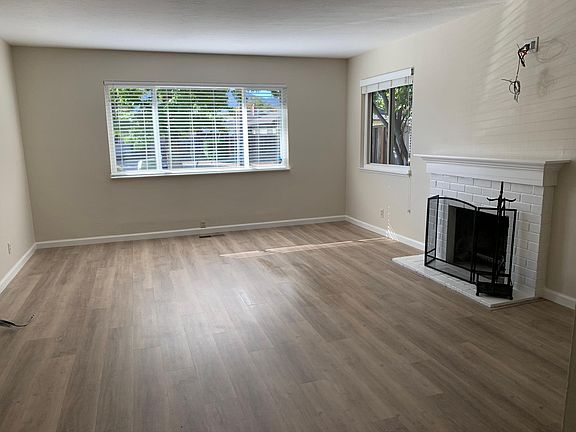 Living Room facing Street with Real Wood Burning Fireplace