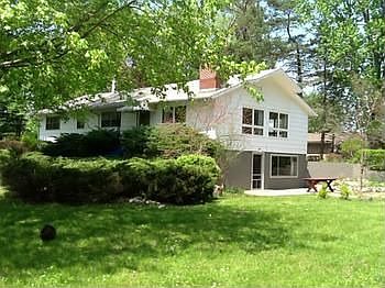 Well maintained ranch on 6.44 acres in the city of Midland. Water & sewer have been hooked up, only a partial sewer assessment remains. Very spacious with 3 BR2.5 Bath.  Great living room with large windows overlooking this beautiful property. Kitchen features updated oven, range, lighting, sink, & fresh paint. The bedrooms are also spacious & feature new carpet. All baths are tile. The walkout basement features a huge 32x27 barrier free family room with 2nd fireplace & wet bar. This area was in fact used for square dancing lessons and would make a great dance studio or exercise room. There is a separate entrance & a 34 bath on this level. The furnace, CAC were replaced in 2008, new roof in 2007. Beautiful property that can be split for at least one more building site. There is an extra sewer hookup at the road. City water & sewer have been added & are hooked up. The water assessment is paid off, a partial sewer assessment remains to be assumed by the buyer. 30x40 pole barn.