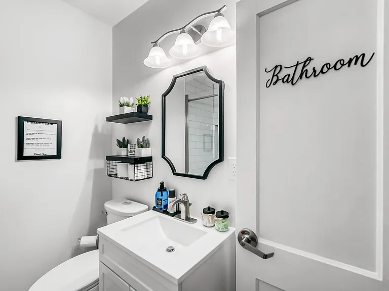 Bathroom #1. Enjoy complimentary mouth wash, flossers and q-tips