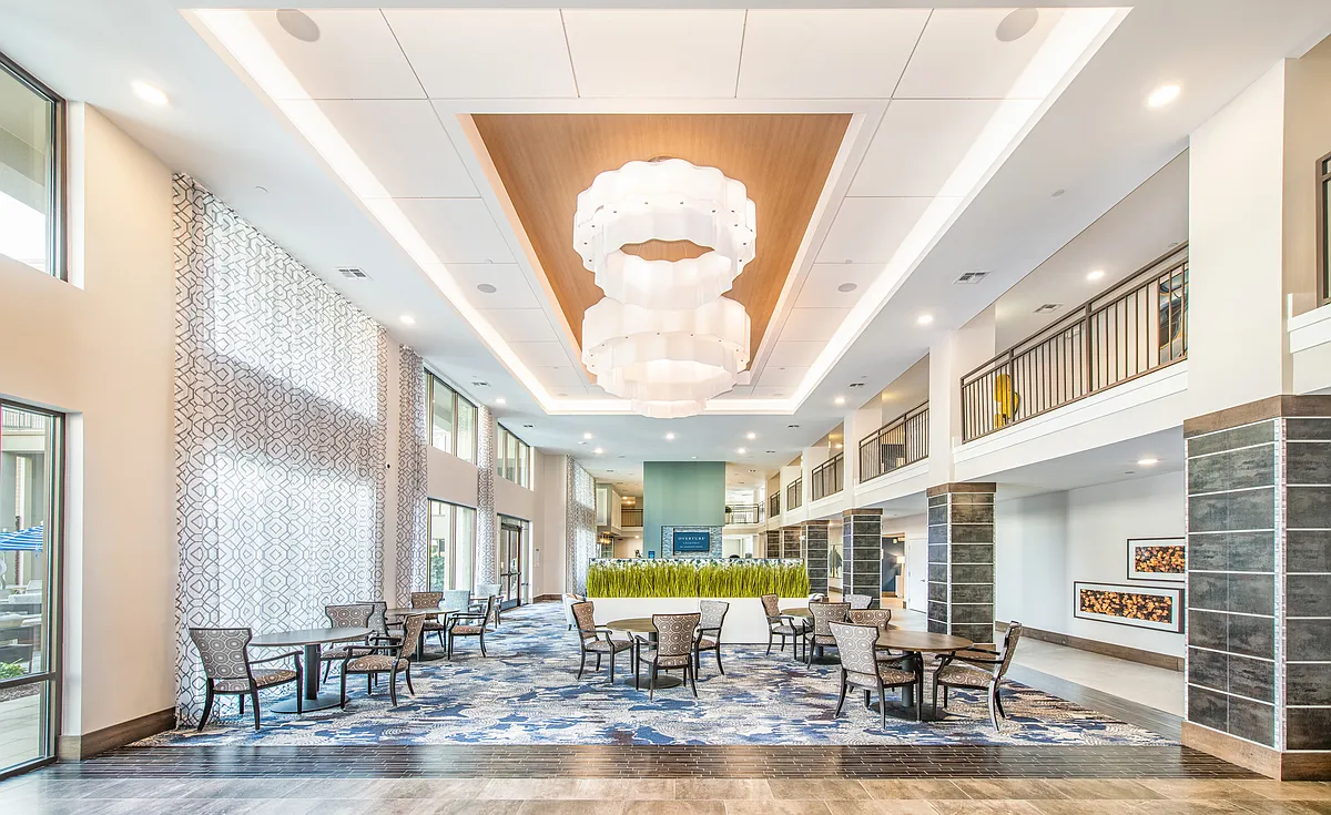 The Scene - Clubroom - Overture Crabtree 55+ Apartment Homes