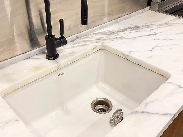 Marble countertops, cast iron sink