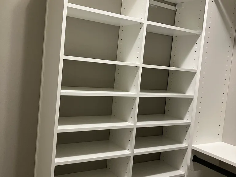 Shoe rack in master bedroom closet