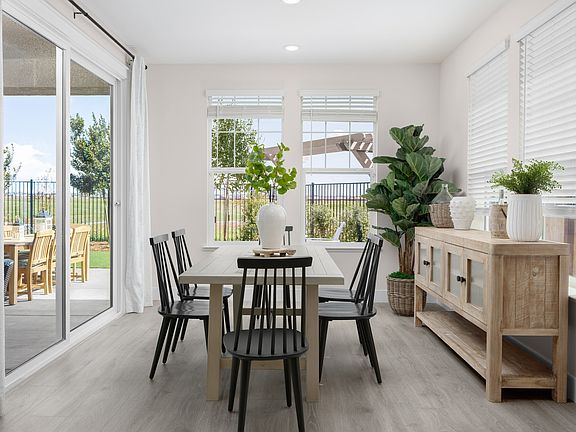 Dining area with sliding door to the covered patio