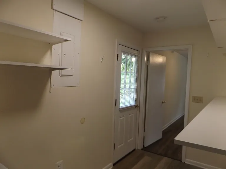 Back door exit in Laundry/Storage Room