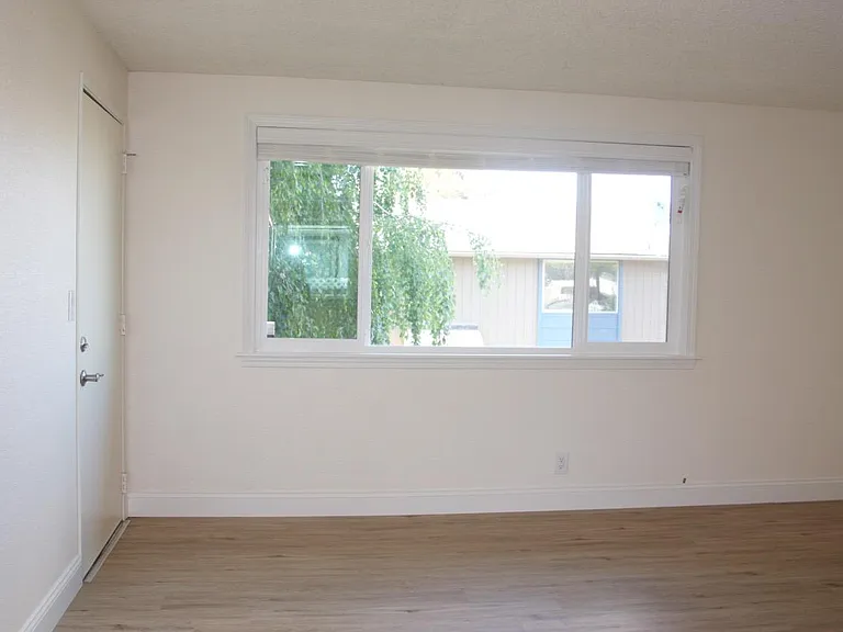 Unit fully updated in 2018, including new plank floors and windows and all new trim, blinds, etc.