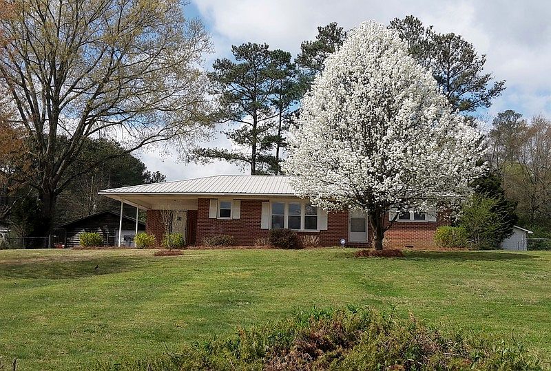 Large and Level Corner Lot!
						:
						Approx 1/2 acre corner lot - house faces the golf course!