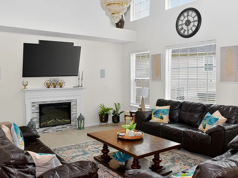 Livingroom _ Shown furnished. If a furnished rental arrangement is agreed upon, the room would be presented as shown.