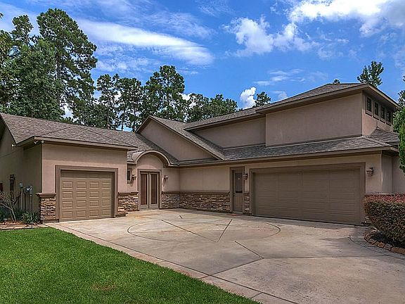 Three-car+ garage and a separate entrance into the guest suite.
