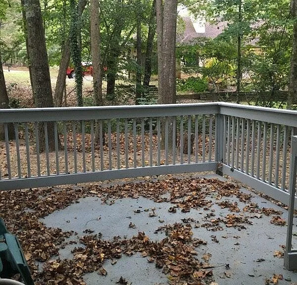 Fenced-in Basement Patio for Relaxing or Light Grilling