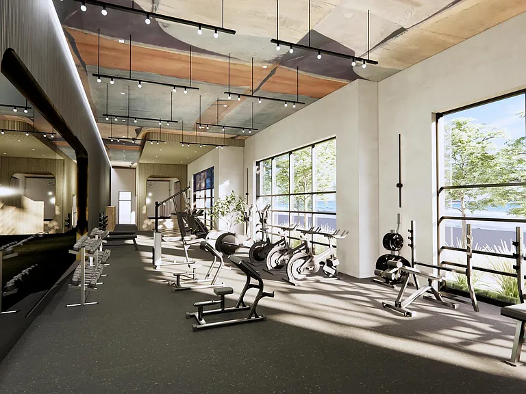 Club-quality fitness studio with spin bikes and group fitness area at Modera Revere Beach in Revere, MA.