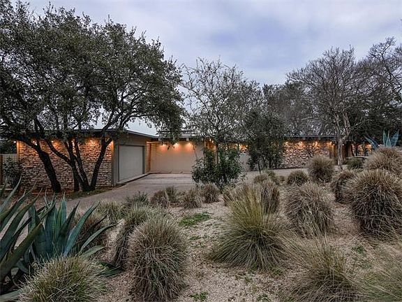 Intentionally modest from the curb, the view takes your breath away through the front door.