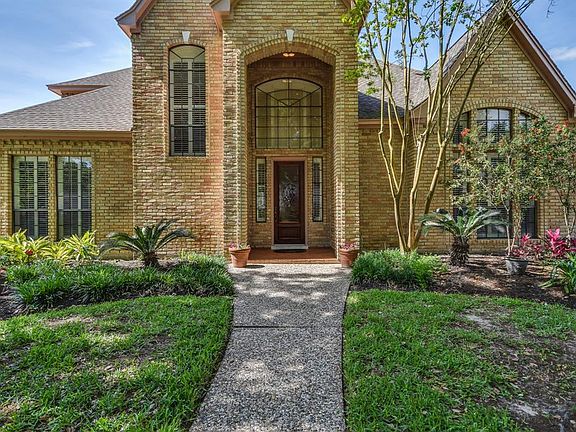 Solid brick front elevation and recent roof.