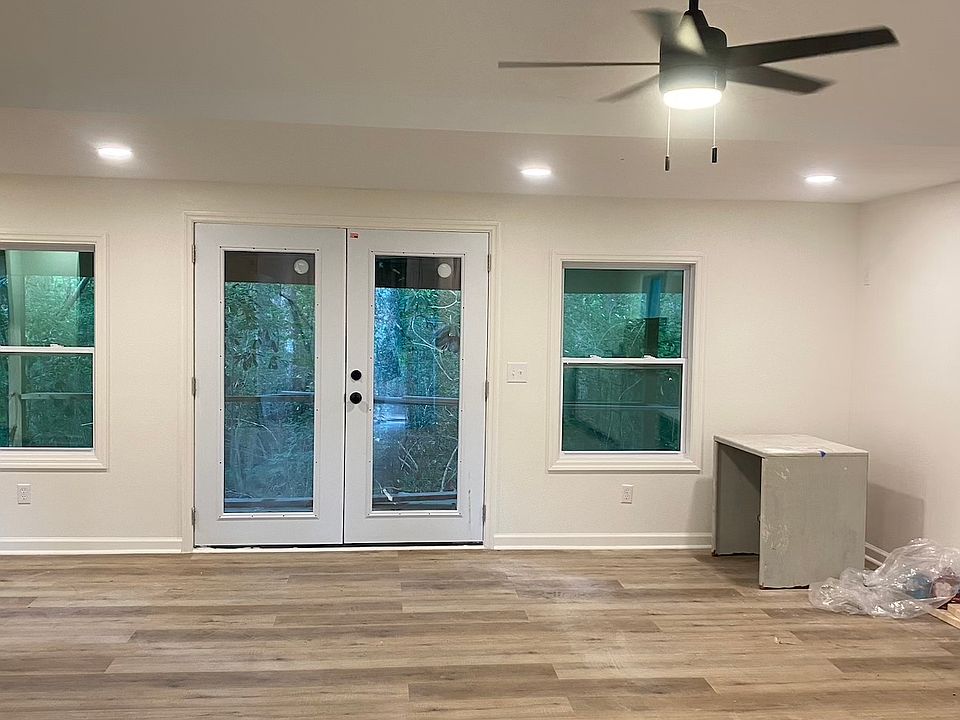 View out the back door into the woods