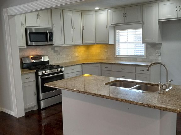 Island kitchen with counter for eating