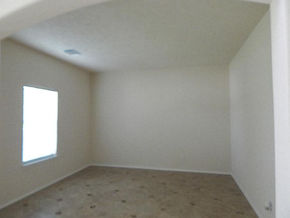 FORMAL LIVING/STUDY WITH TILE FLOORS