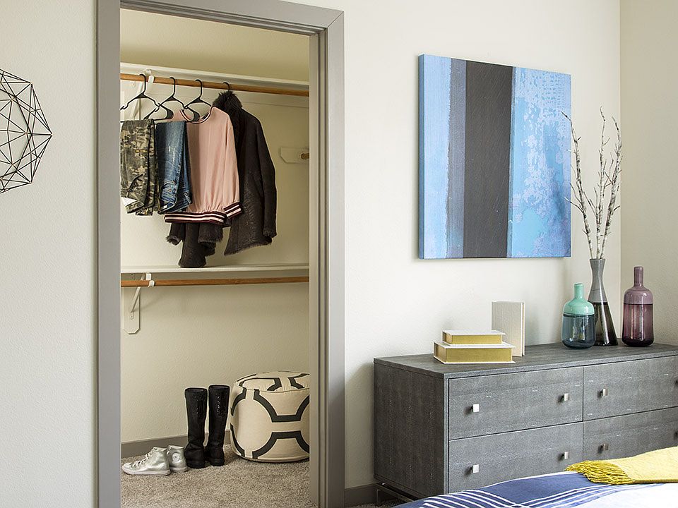Spacious apartment Bedroom with Large Closet and Wood Floors.