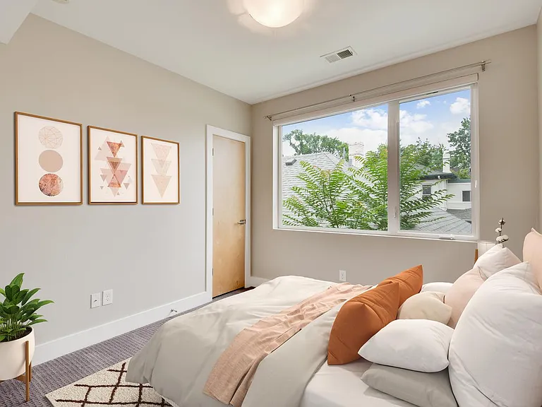 Bedroom 2. This image shows a virtually furnished space. Bedrooms come unfurnished.