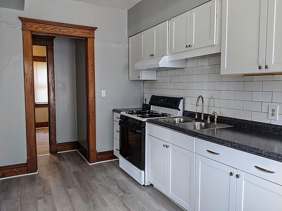 Kitchen to full bathroom