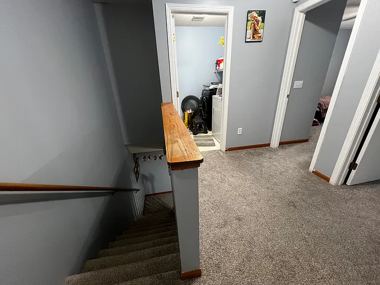 stair to bedroom and open loft