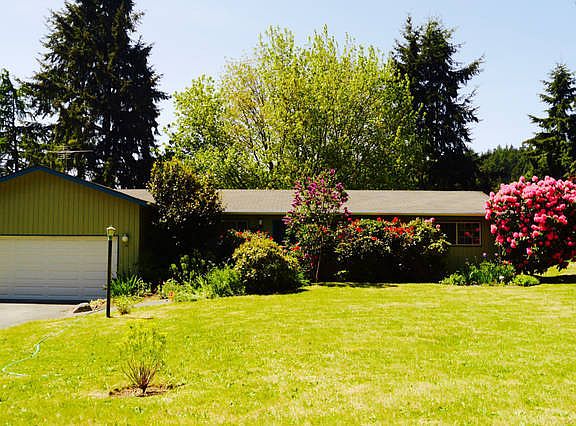 Front Yard-Garage
						:
						Deep Set lot with attached 2 car garage