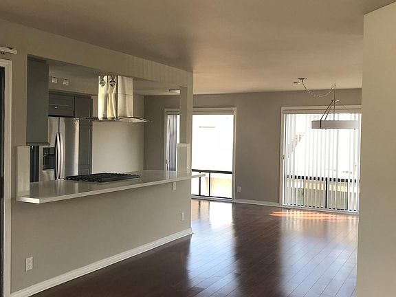 View from living area to kitchen and dining area. 