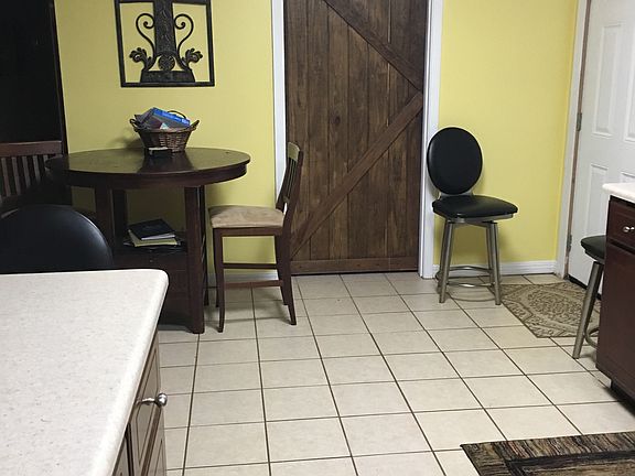 Laundry and pantry with barn